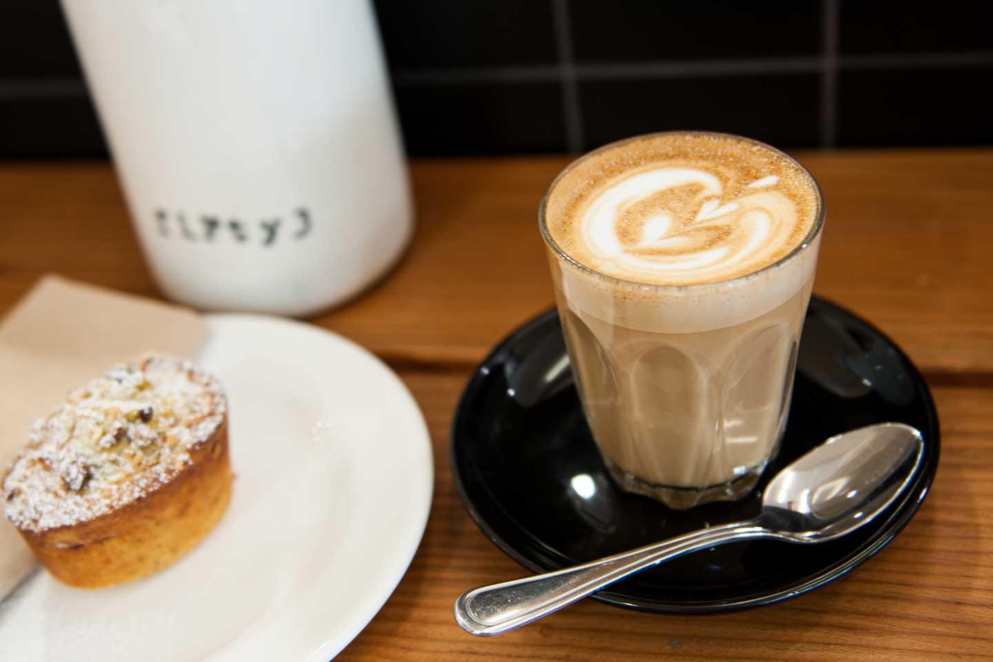 A cup of coffee on a wooden table